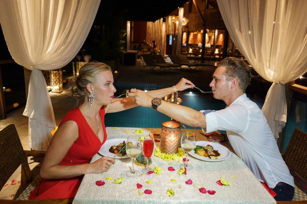 Hotel Tejaprana Bisma - Chse Certified Ubud Exteriér fotografie A couple dining at a restaurant